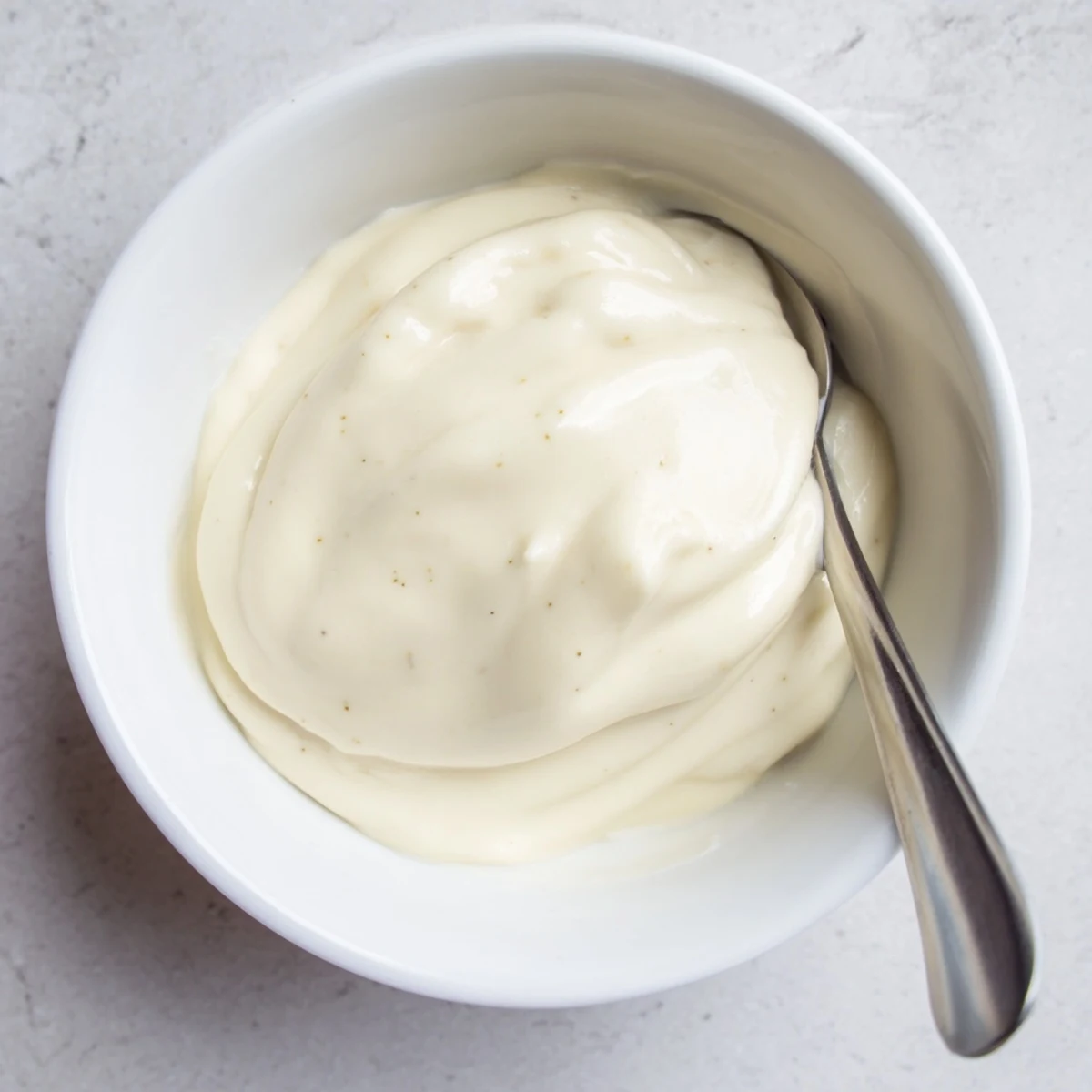 Picture of a creamy filling, perfectly smooth and ready to fill pastries and cakes, a dessert delight.