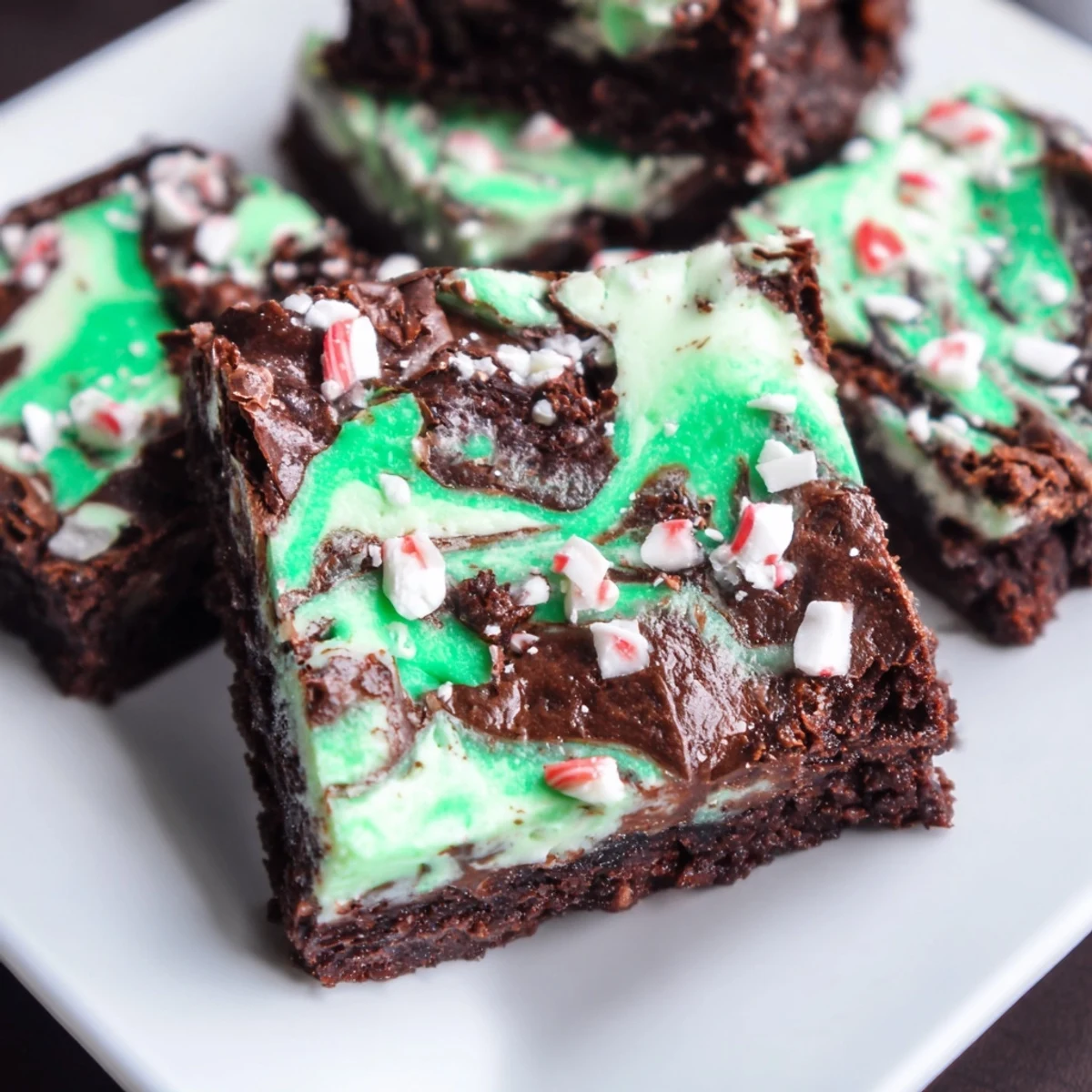 These festive Peppermint Swirl Brownies feature a perfect swirl of peppermint cream and rich brownie base.