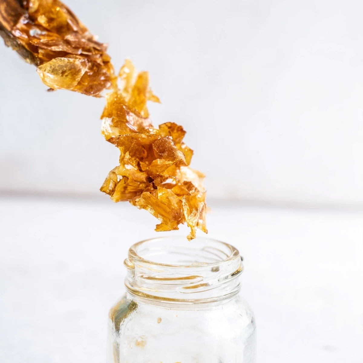 Close-up of a bottle of garlic-infused oil; a versatile, homemade Mediterranean condiment.